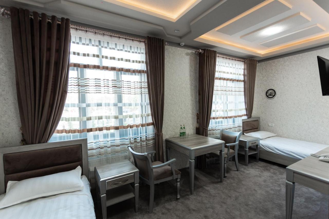 Diyor Hotel Marghilon 外观 照片