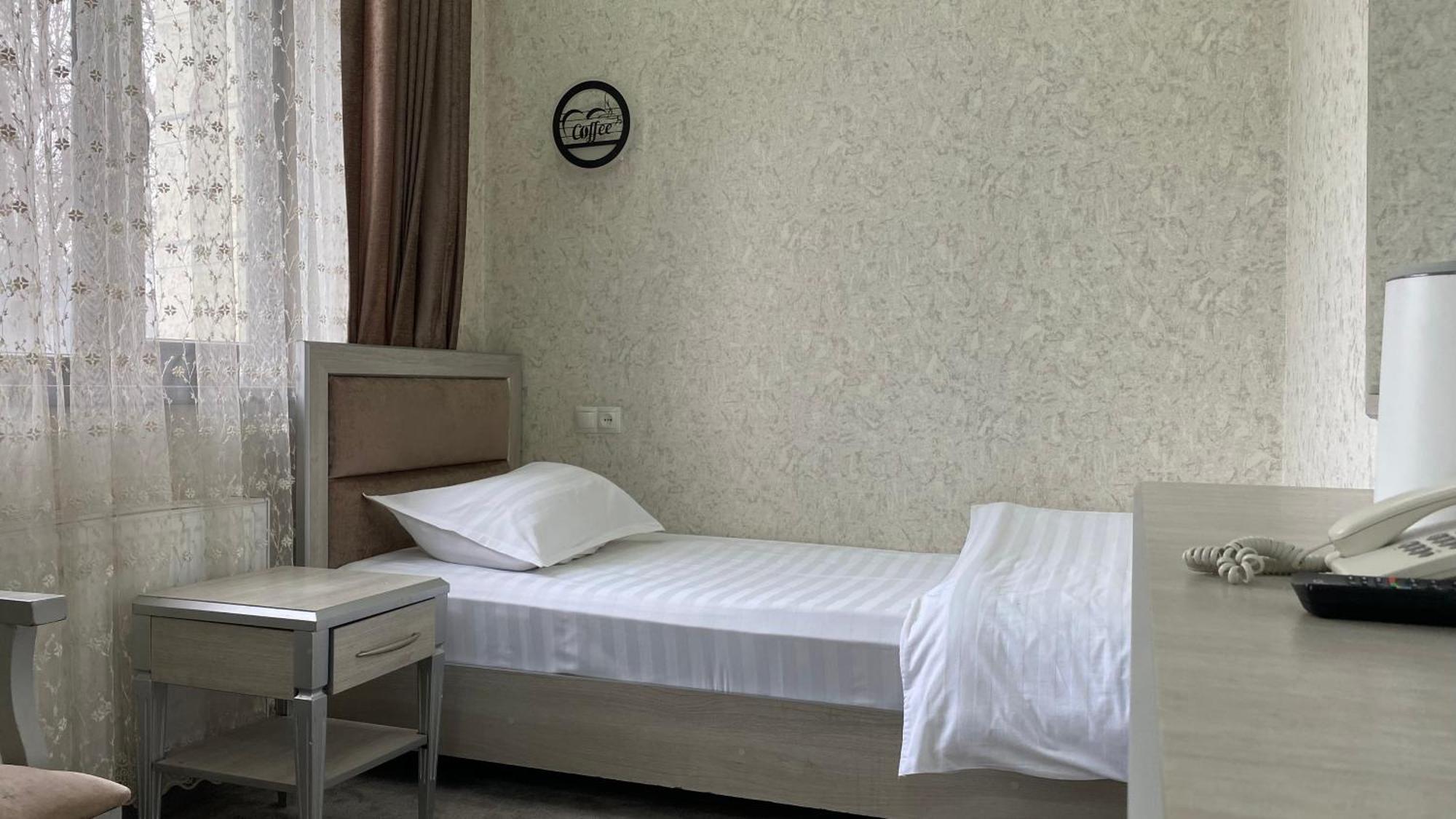 Diyor Hotel Marghilon 外观 照片