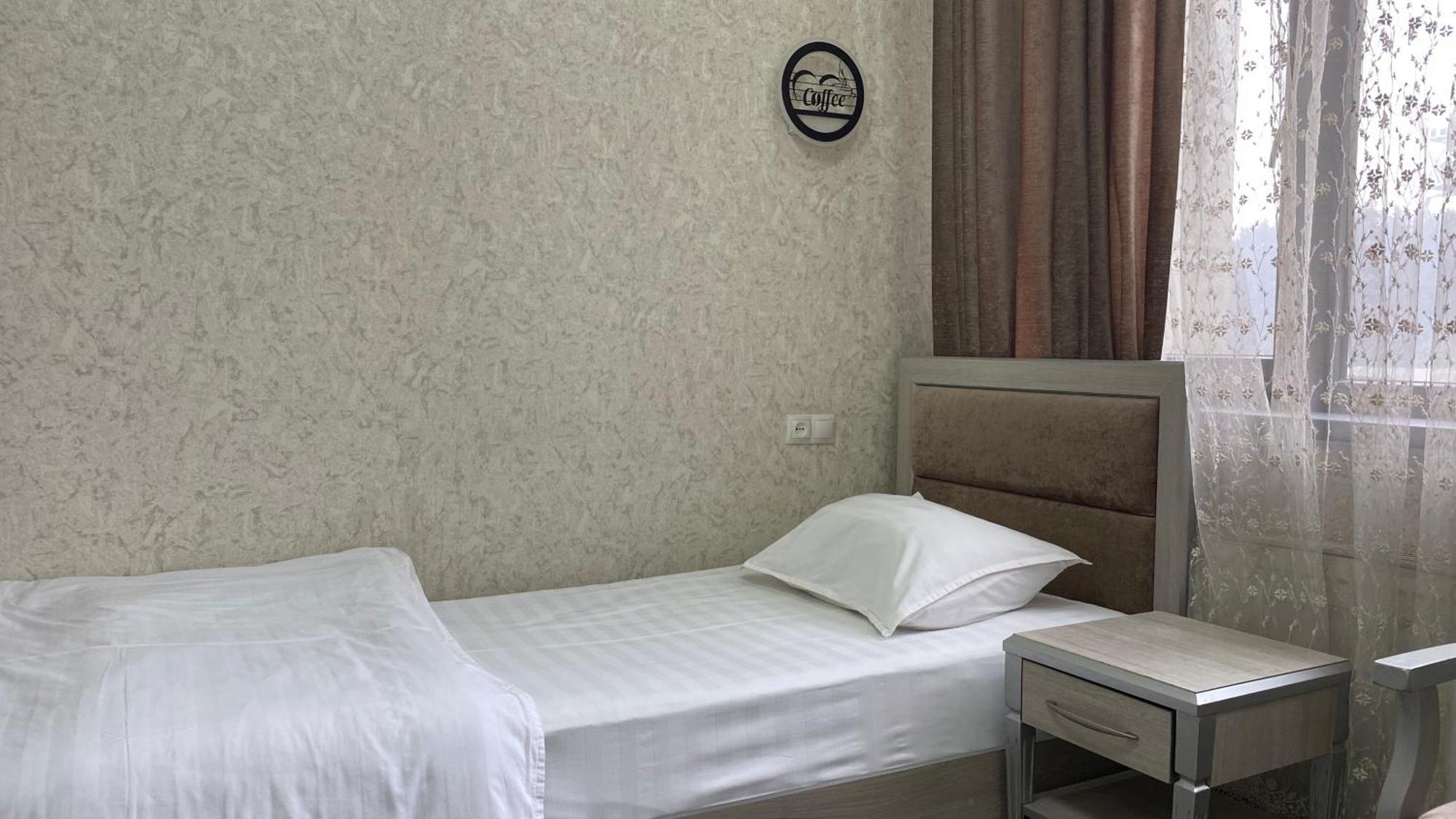 Diyor Hotel Marghilon 外观 照片