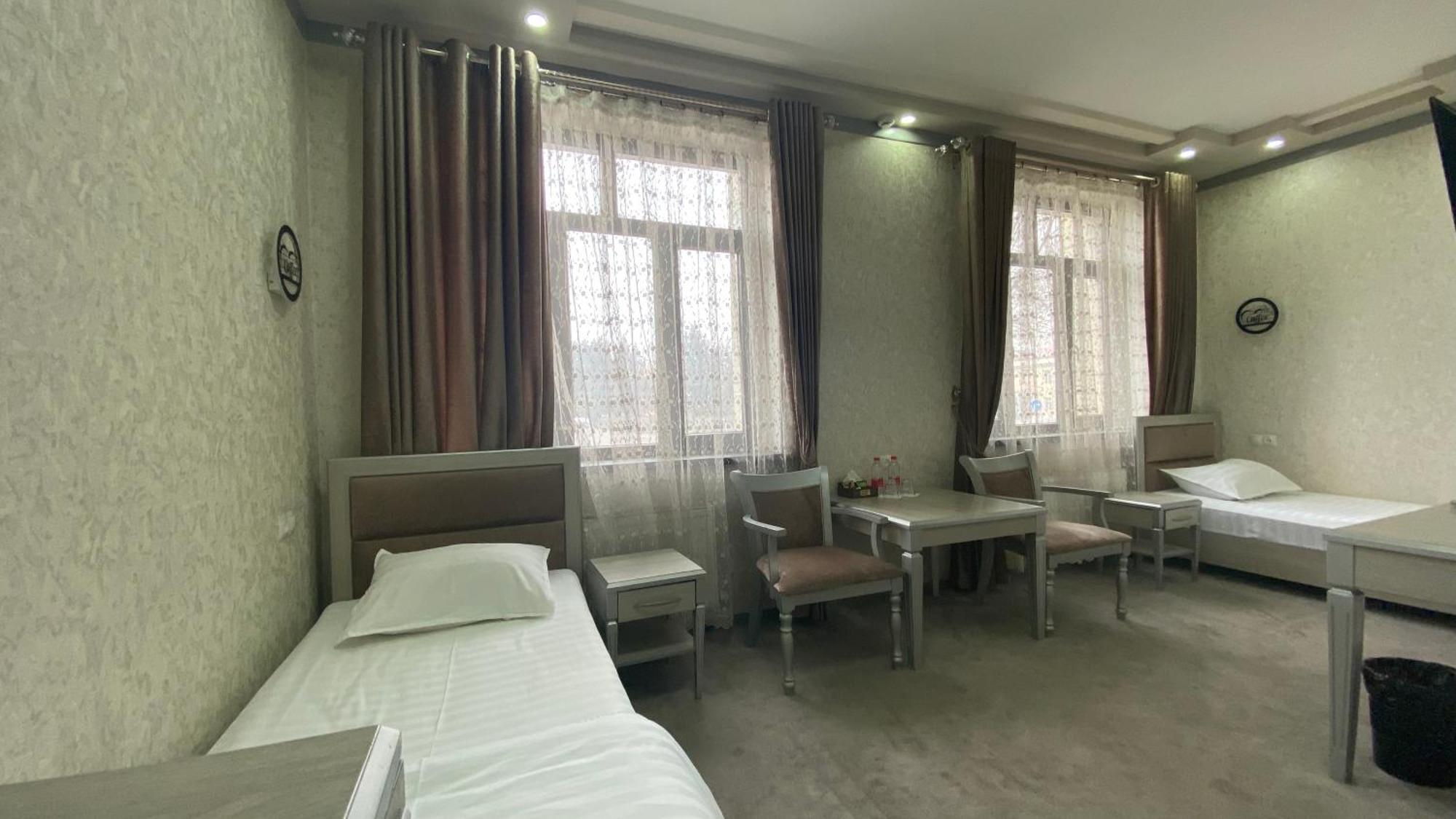 Diyor Hotel Marghilon 外观 照片