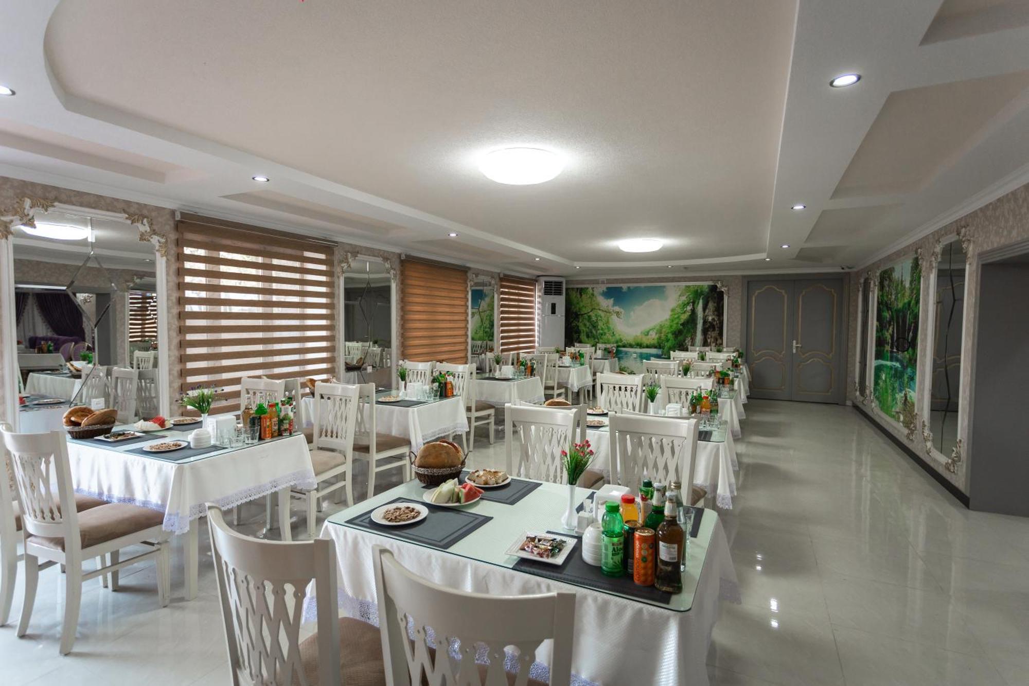 Diyor Hotel Marghilon 外观 照片
