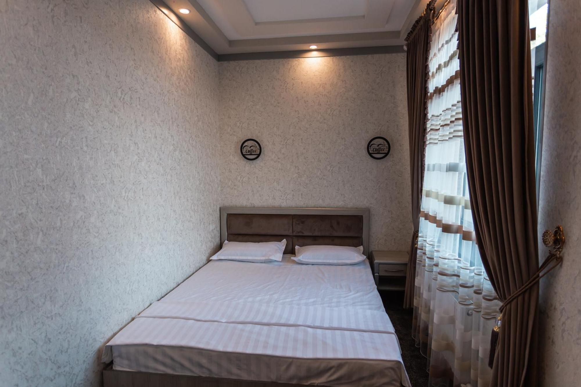Diyor Hotel Marghilon 外观 照片