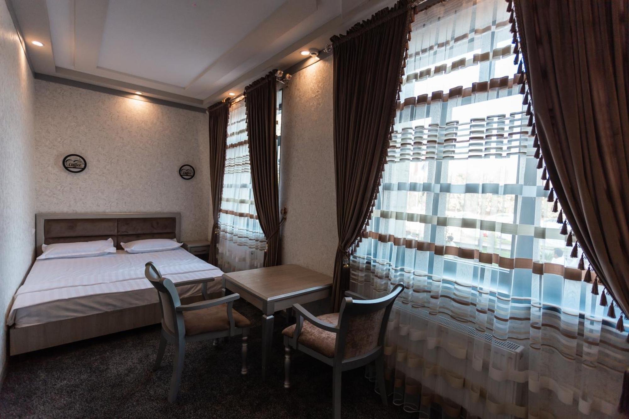 Diyor Hotel Marghilon 外观 照片
